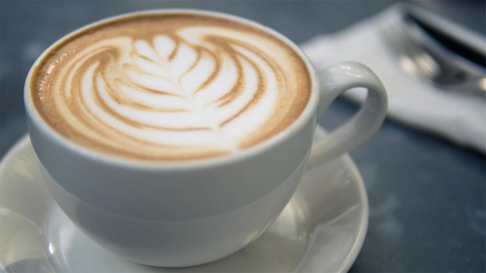 A latte with leaf art
